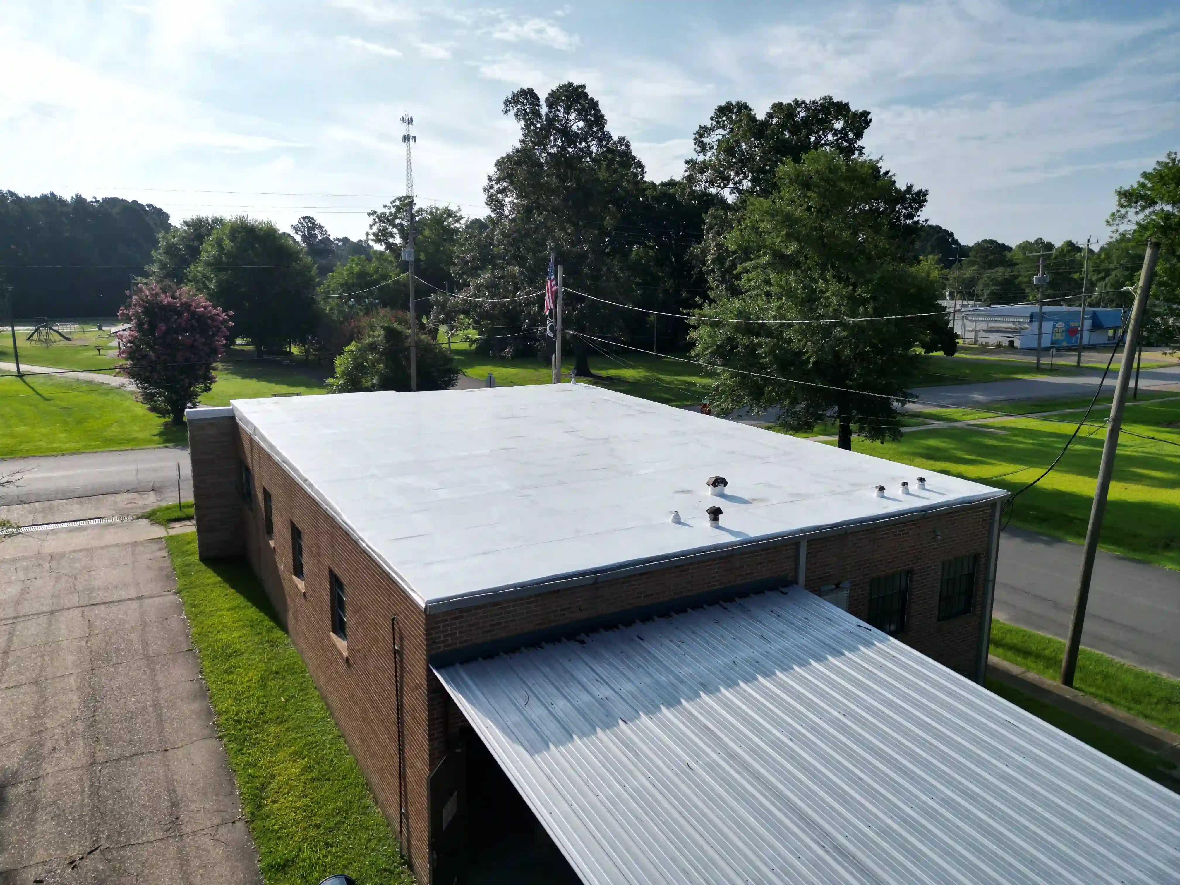 Flat commercial membrane roof on a downtown Arkadelphia-area brick building